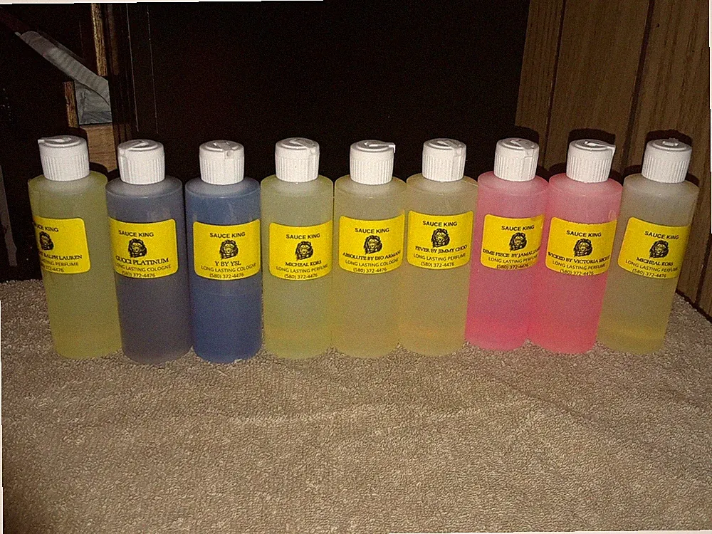 Wholesale body oils( 9) 4oz bottles of top selling perfumes and 144 bottles.